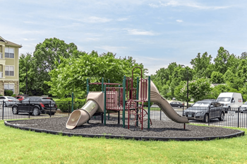 Tot lot with rubber surface